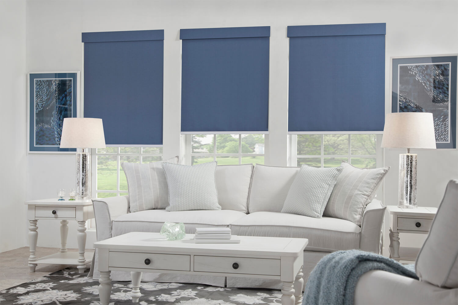 living room with blue roller shades | window treatments Brownsburg, IN